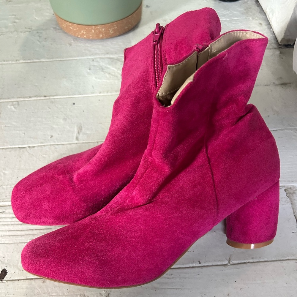 Hot pink suede ankle boots with large round heel, great preloved condition.